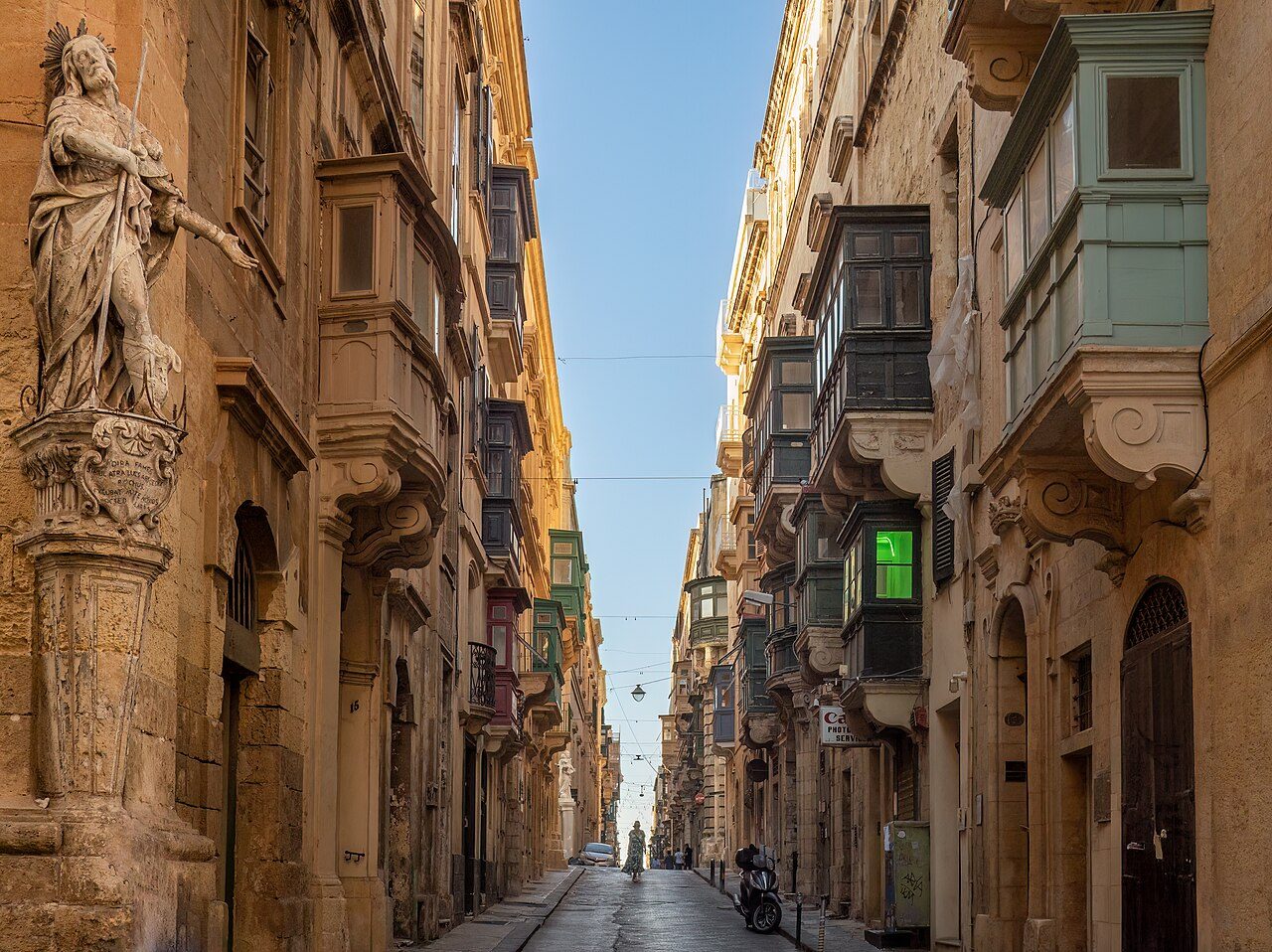 Saint Christopher Street at Ursula Street in Valletta, Malta, with a statue of St. Roque