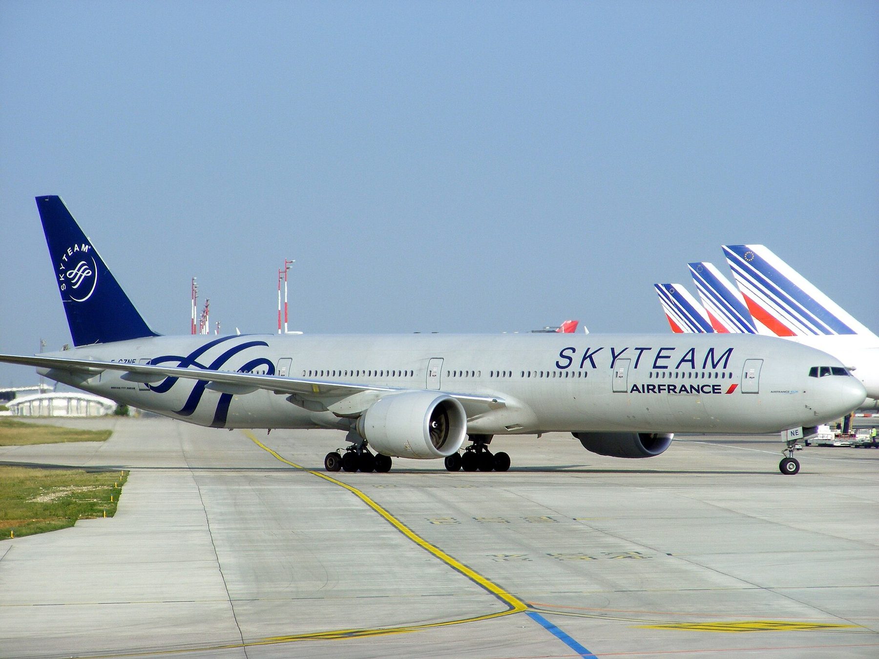 An Air France Boeing 777 painted in SkyTeam livery on the ground at Paris Charles de Gaulle Airport