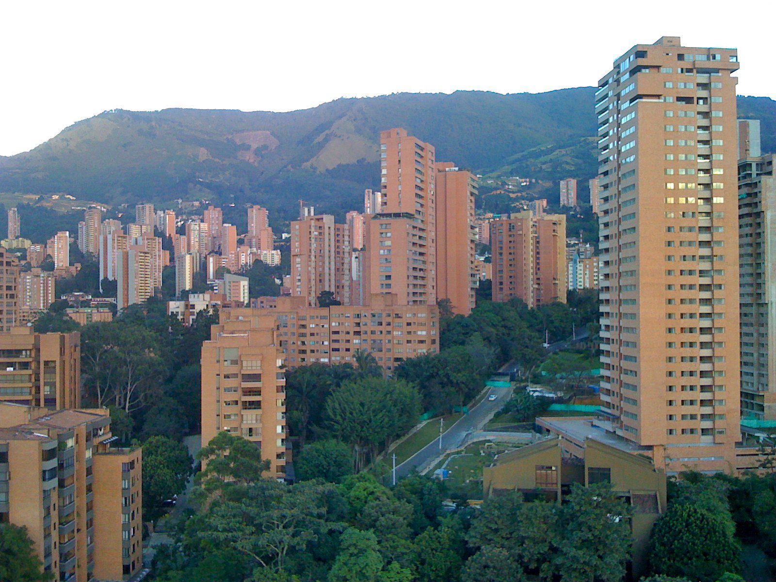 Apartment towers and green hillsides in the El Poblado neighborhood of Medellín, Colombia