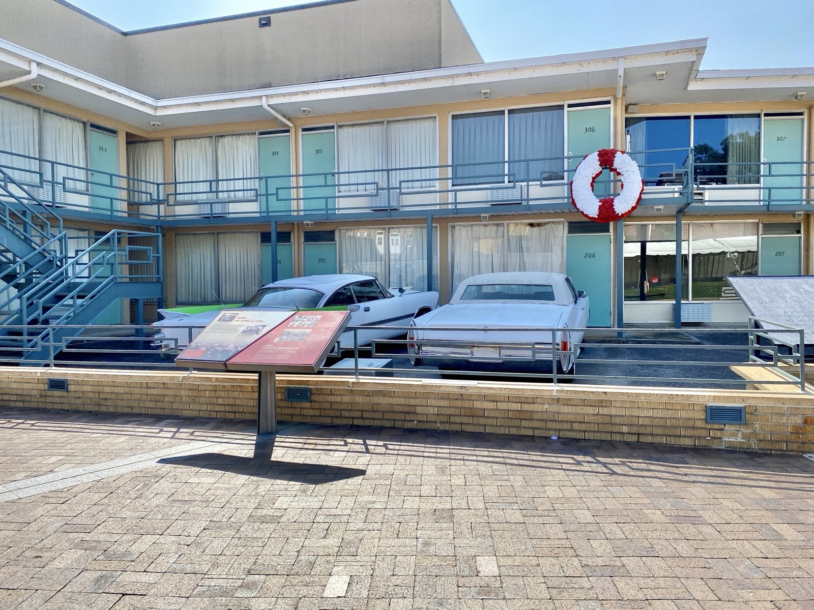 The turquoise doors and cream balcony of the Lorraine Motel, now the National Civil Rights Museum, on Mulberry Street in Memphis