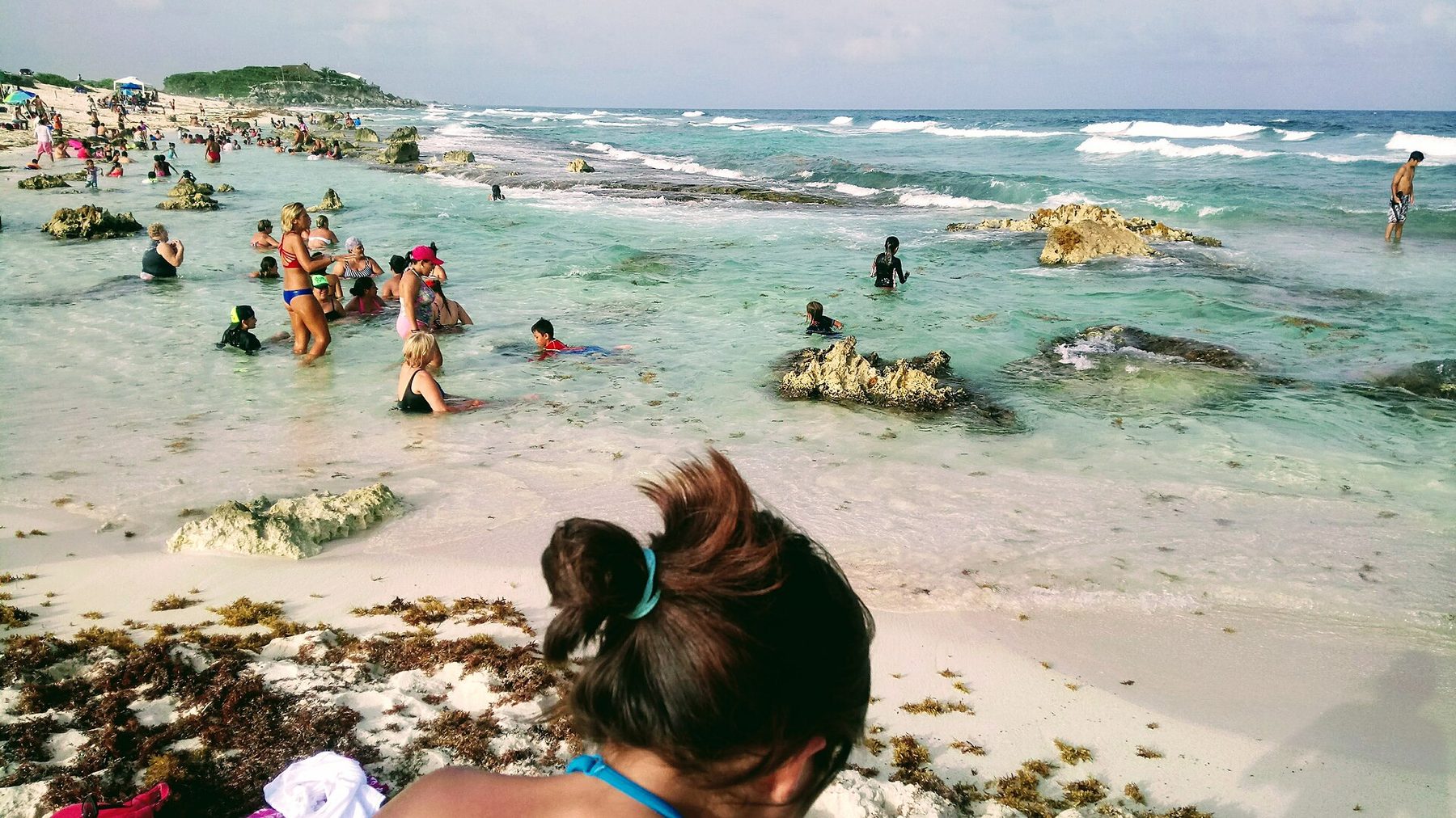 The sandy bay and rocky shoreline at Chen Río on the east coast of Cozumel