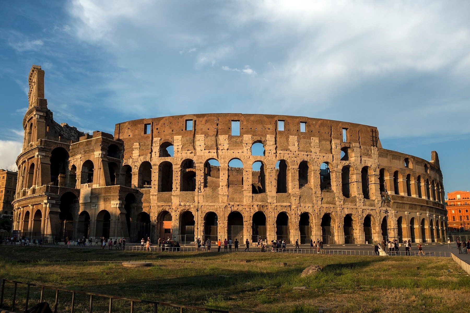 The illuminated Colosseum exterior in Rome at dusk