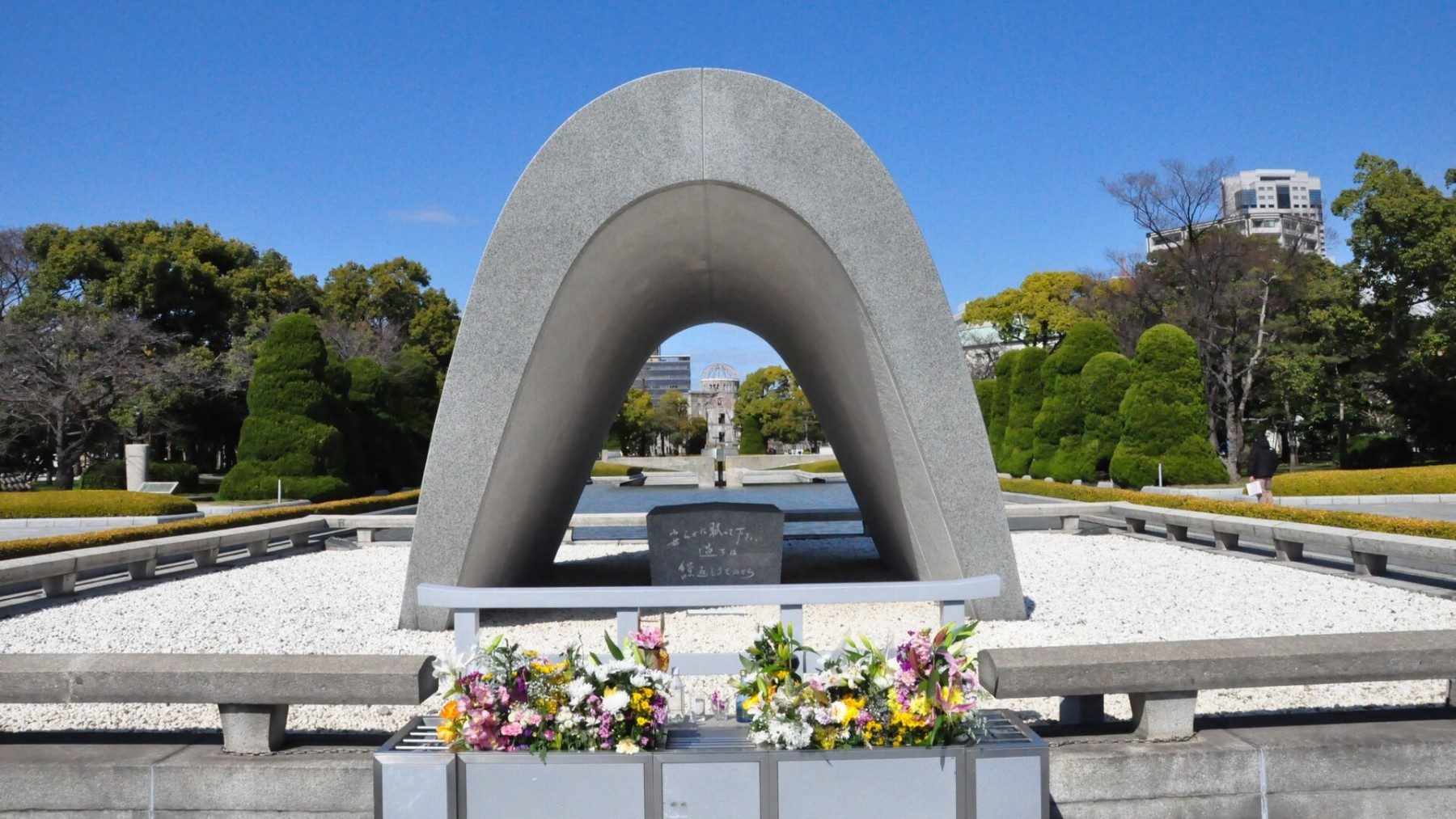 A view through Hiroshima Peace Memorial Park with the Atomic Bomb Dome in the background